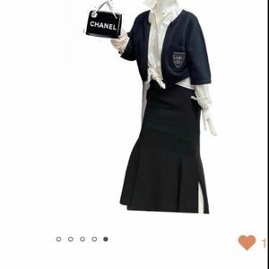 LA PETITE VESTE NOIRE